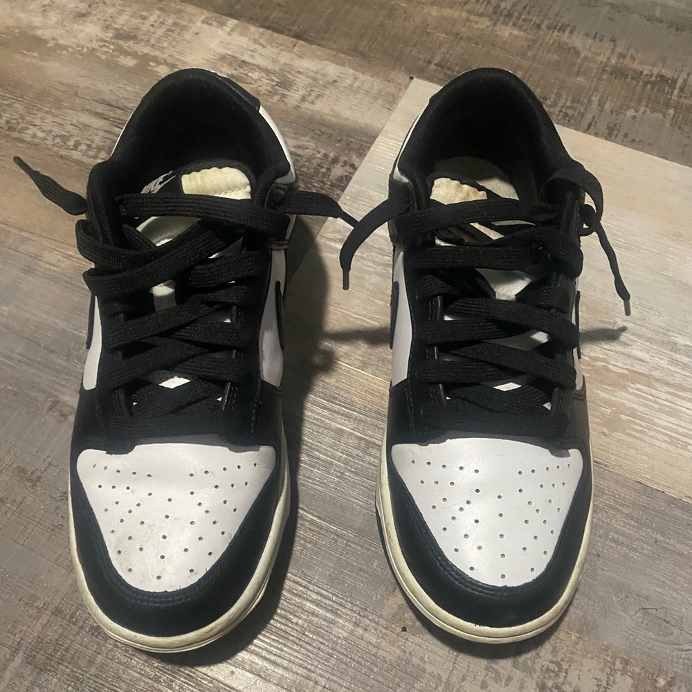 This is a Nike Dunk Low Retro in the "Panda" black and white colorway